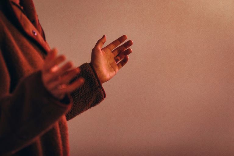 Arms raised in worship